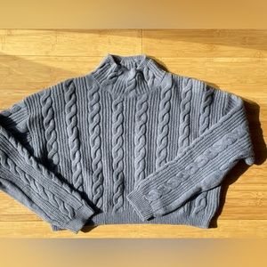 Cableknit cropped women’s sweater